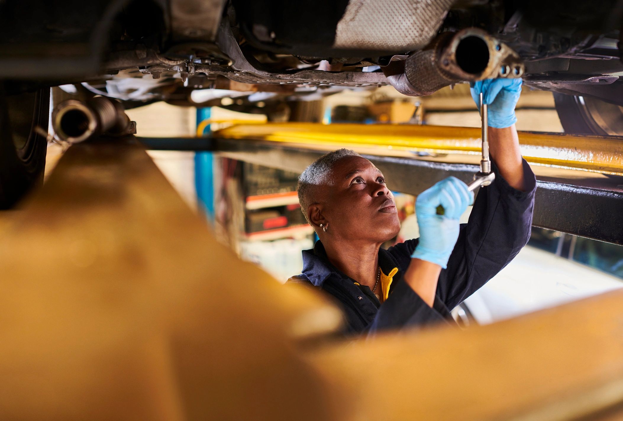 Technician inspecting a brake rotor
