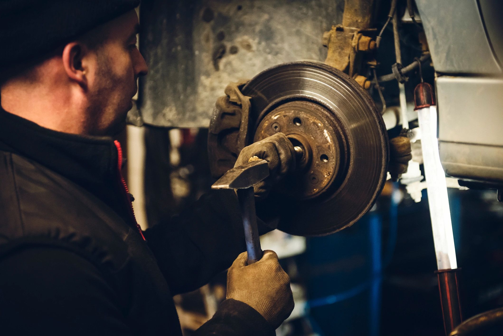 Auto mechanic working in a service bay
